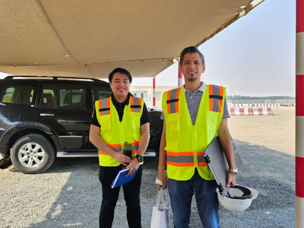 two-people-wearing-yellow-orange